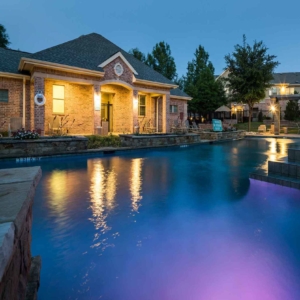 Nighttime pool view of second pool at Villas